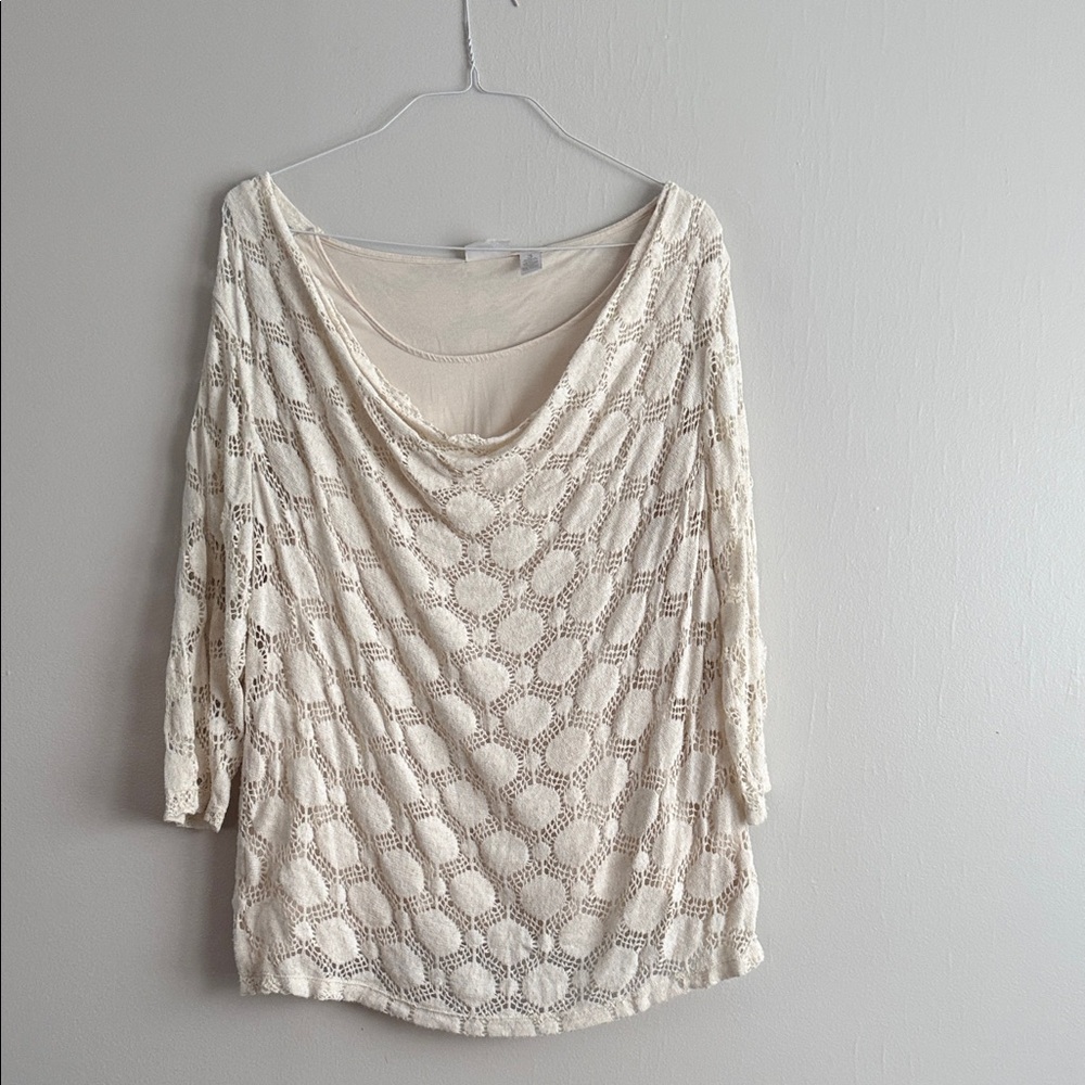 The double blouse is arranged in water..Chicos 3